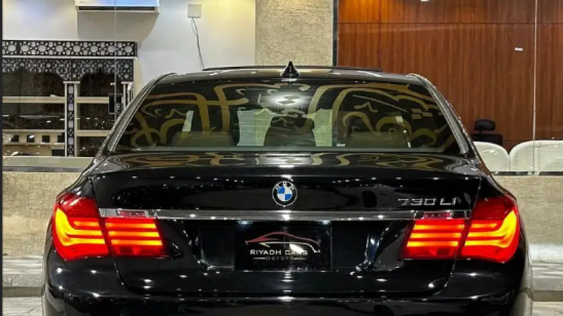 by-am-dblyo-730li-2015-bmw-730li-2015-big-1